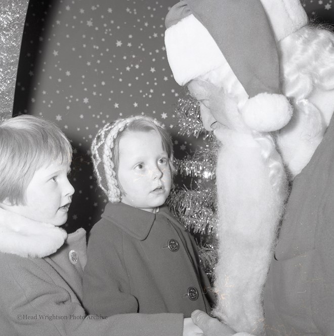 Father Christmas with children