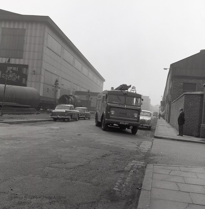 A Gathering Of Fire Engines In S. F. Car Park