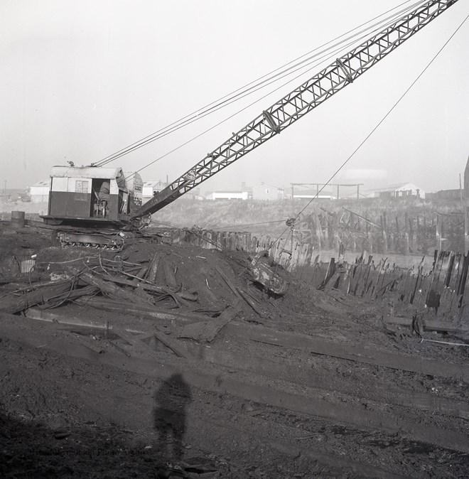 Excavating mud for new slipway