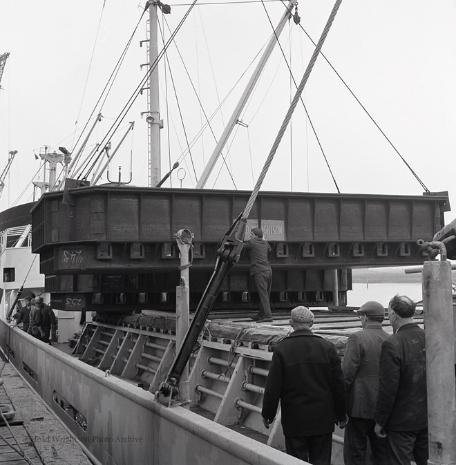 Loading Norweign Charge Pans On Boat