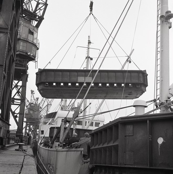 Loading Norweign Charge Pans On Boat