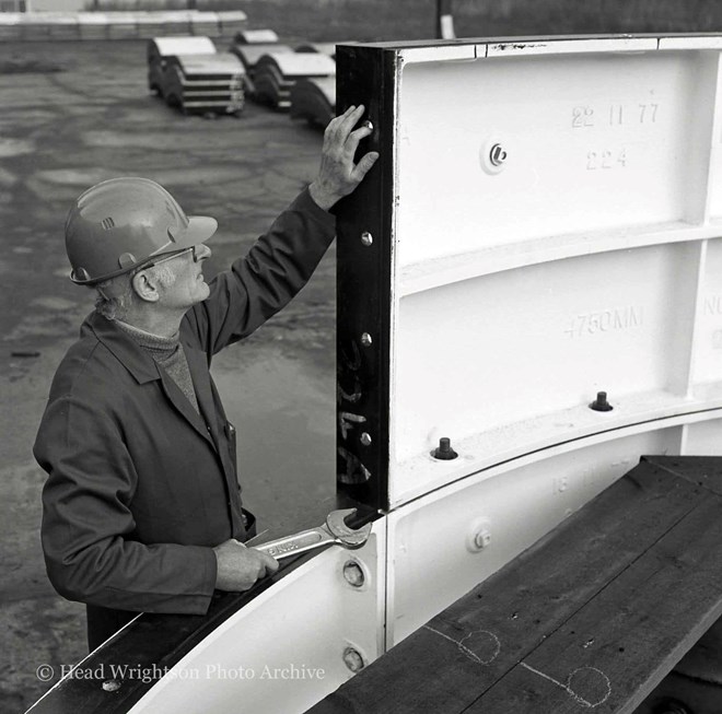 Bill Page, chief inspector at the Eaglescliffe iron foundry tests for accuracy of segments for the new Selby mine against a master ring.