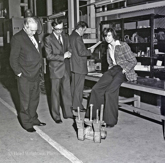 Moulding apprentices and staff reviewing their work