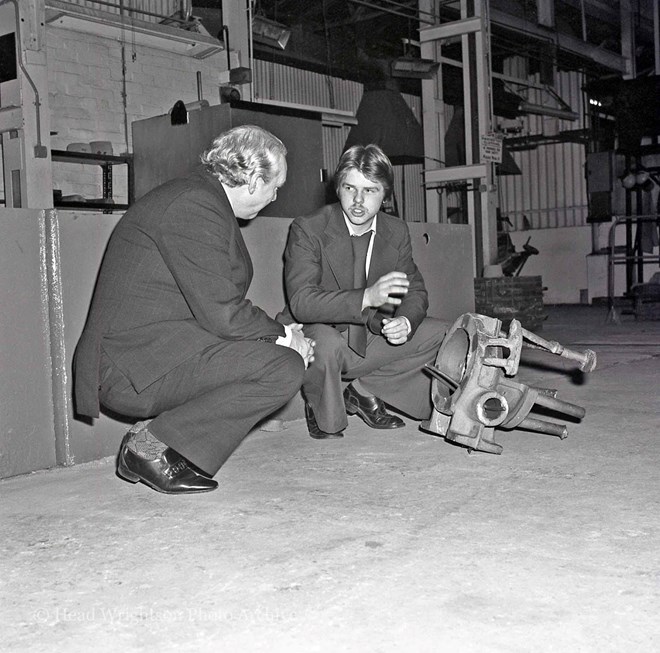 Moulding apprentices and staff reviewing their work