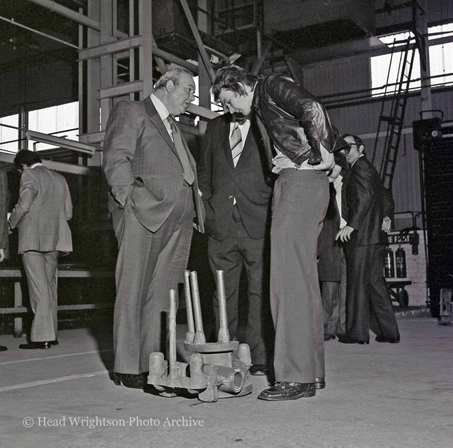 Moulding apprentices and staff reviewing their work