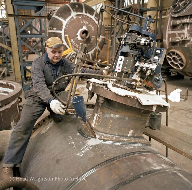 Man using a Lincoln Electric Squirt Welder