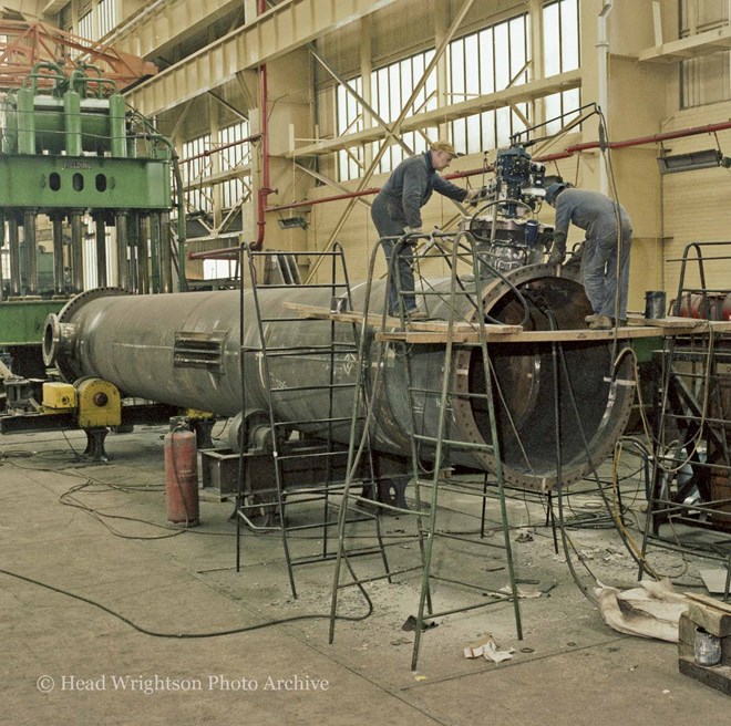 Man using a Lincoln Electric Squirt Welder