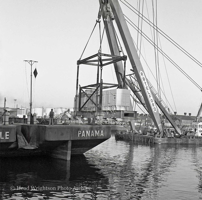 Floating crane loading equipment onto barge, Middlesbrough Docks