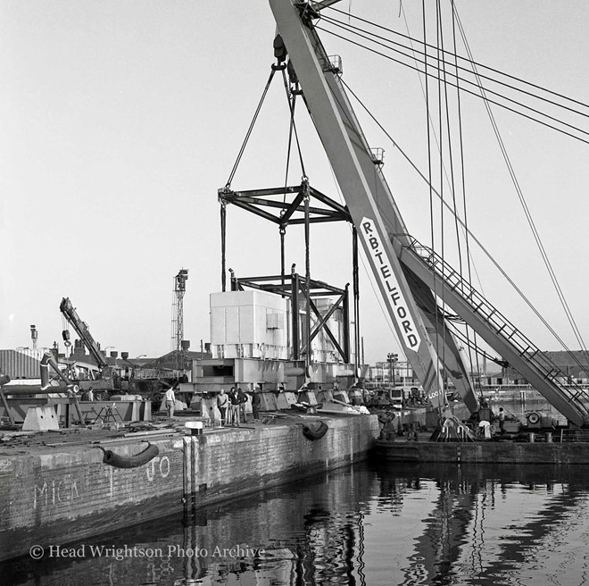 Floating crane loading equipment onto barge, Middlesbrough Docks
