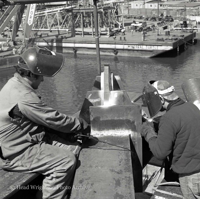 A pair of welders working high above Middlesbrough Docks