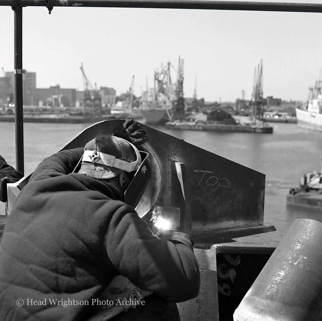 A pair of welders working high above Middlesbrough Docks