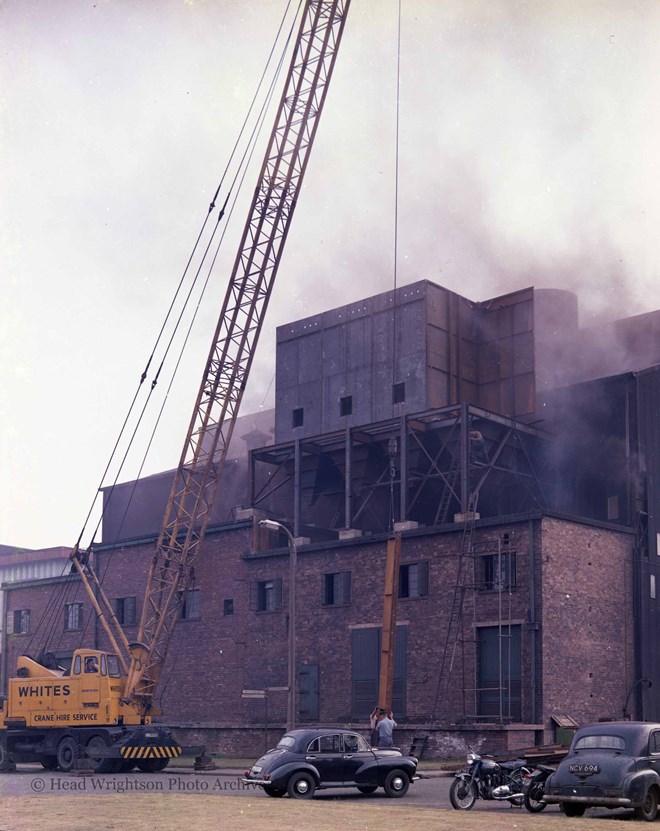 Smoke pouring from the Furnace in the Foundry (Exterior)