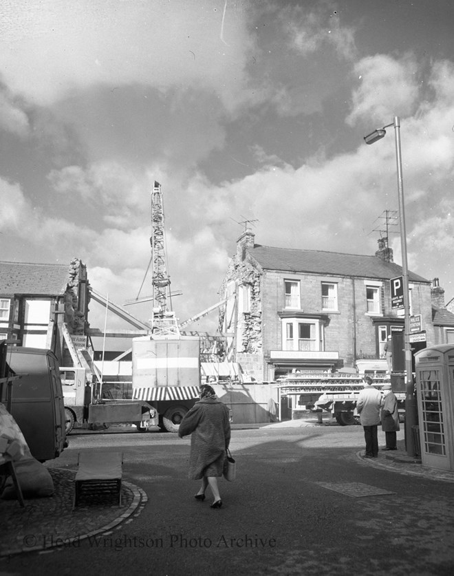 photograph of crane lifting filigree