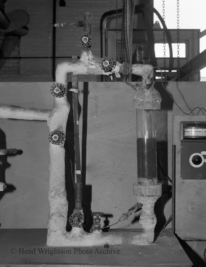 Various photographs of rigs in sinter lab. Sintering is a process heat treating materials prior to use in steel manufacture.