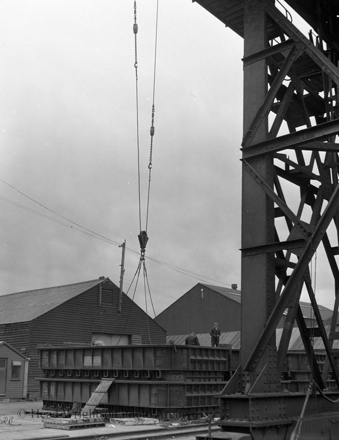 Loading of Norwegian charge pans on board. Charge pans were the used to load/charge furnaces.