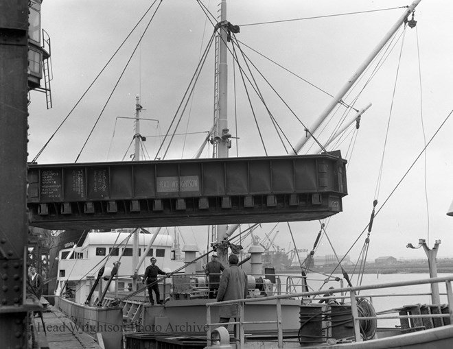 Loading of Norwegian charge pans on board. Charge pans were the used to load/charge furnaces.