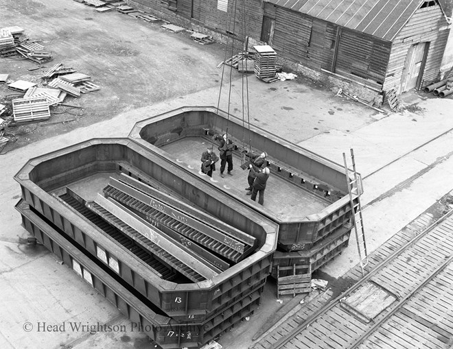 Loading of Norwegian Charge Pans On Board. Charge pans were the used to load/charge furnaces.