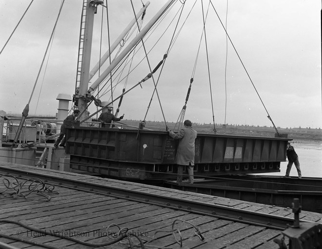 Loading of Norwegian Charge Pans On Board. Charge pans were then used to load/charge furnaces.