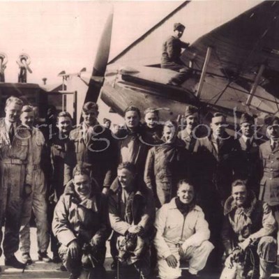 Members of 608 Squadron in front of a Hawker Demon