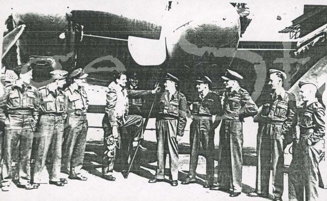 Members of 608 Squadron and a de Havilland Mosquito