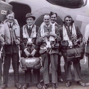 Aircrew and news reporters with a Hudson aircraft