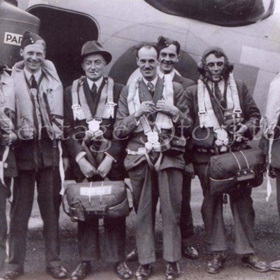 Aircrew and news reporters with a Hudson aircraft