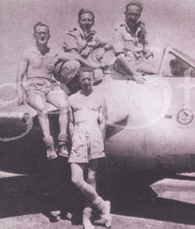 Tom Dring, Cpl Lawson, and 2 other 608 members at summer camp with a de Haviland Vampire. circa 1950s