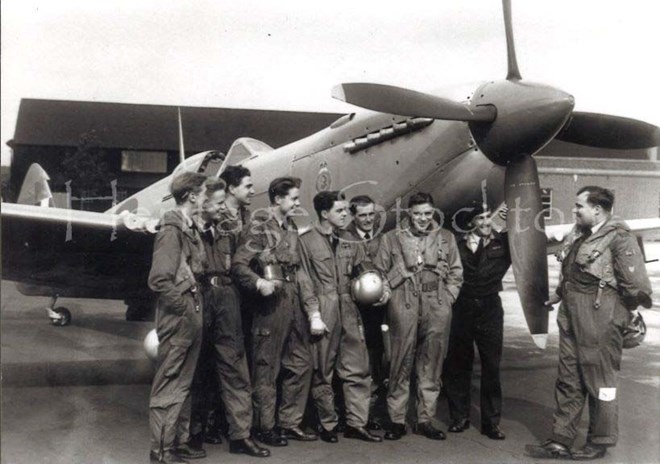 L-R Harry Bates, George Joyce, Wolstenholme, Mackenzie, Neil Hancock, Edwards, Brian Meadley, Sgt. Vic Fleming, Hank Costain with a Spitfire LF16 at Thornaby Aerodrome